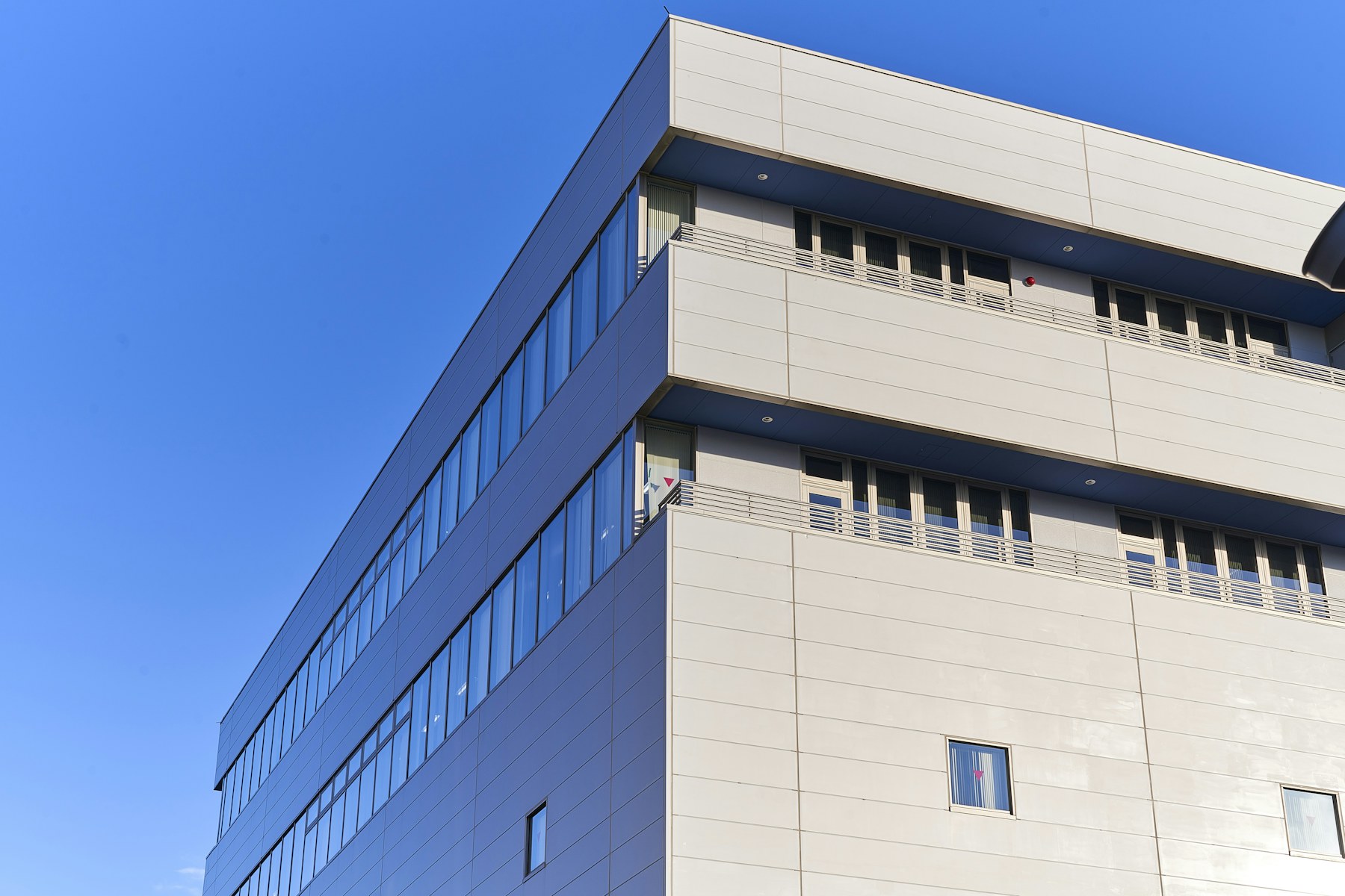 Modern business building under a clear sky